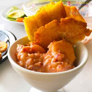 Ceviche Colombiano con tostones.(Colombian Ceviche with fried green plantains)